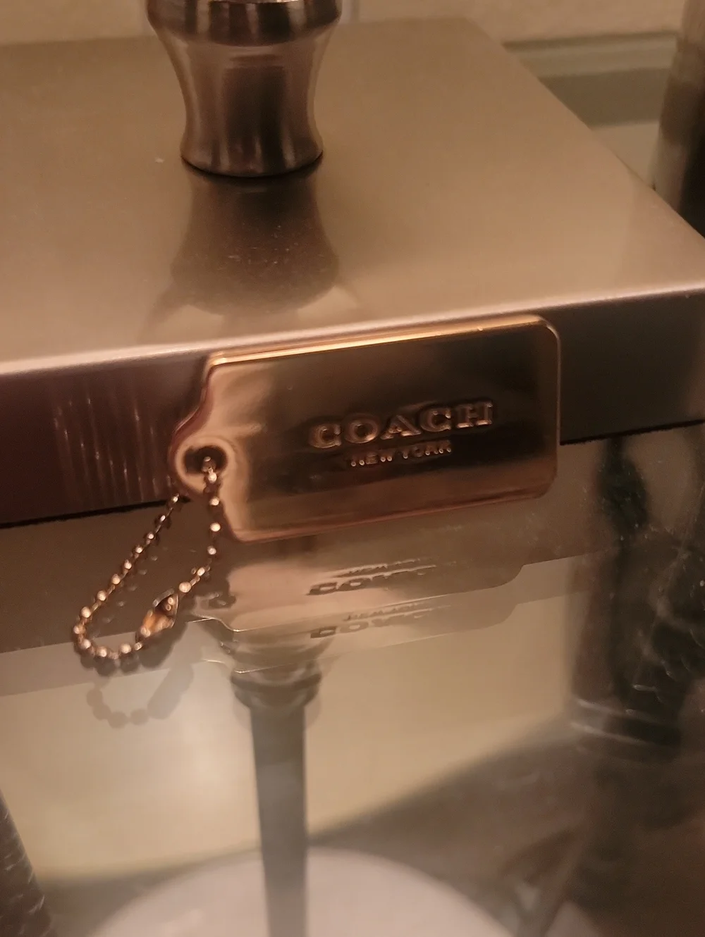 COACH CHARM NEW YORK. GOLD BRASS, THICK METAL FOB BAG KEYCHAIN HANG TAG.